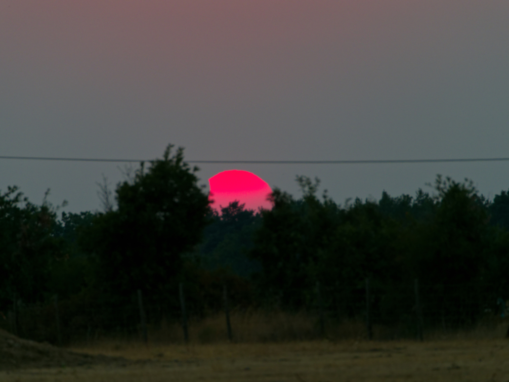Sonnenuntergang, teilweise noch verfinstert